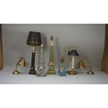 A pair of mid-20th century brass adjustable desk lamps, two glass table lamps,