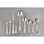 A matched silver flatware service in the hourglass pattern,