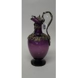 A Victorian silver mounted purple glass claret jug,