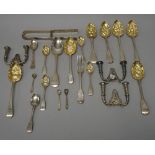 Assorted silver flatware including; a George III pair of asparagus tongs,