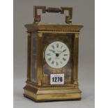 A modern brass cased carriage clock by Charles Frodsham of London, with push repeat,