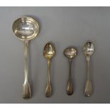 A group of silver fiddle and thread pattern table flatware, comprising; three sauce ladles,