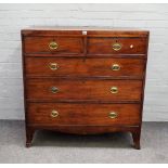 A Regency mahogany chest, two short and three long drawers on splayed legs, 106cms wide,