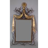A 20th century metal and parcel gilt rectangular wall mirror, with vine and sunburst decoration,