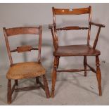 A late 19th century ash and beech knife back open armchair and a smaller child's chair, (2).