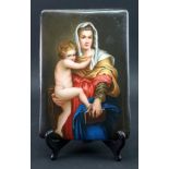 A continental rectangular porcelain plaque, late 19th century, painted with the Madonna and child,