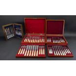 A mahogany cased set of 12 pairs of bone handled electroplate fish knives and forks,