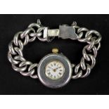 A silver cased bracelet watch, the white enamel dial with Roman numerals, the case detailed '0.