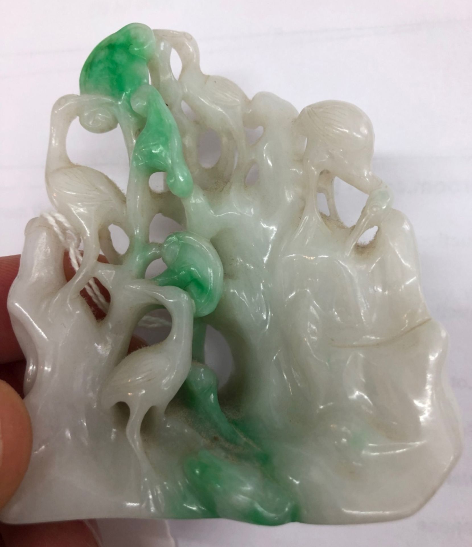 A Chinese jade carving, 20th Century, of four storks amongst trees and rockwork, 8cm high, - Image 3 of 6