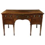 A George III mahogany tulipwood crossbanded boxwood and ebony strung sideboard,