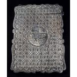 A Victorian shaped rectangular silver visiting cards case, Birmingham 1881, makers D & N,