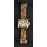 Aster Watch Co; an 18ct gold cushion shaped case lady's wristwatch, with a signed jewelled movement,