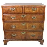 A George II walnut cross and feather banded chest,