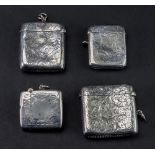 A collection of four Edwardian silver vesta cases, various dates and makers,