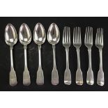 A set of four George IV silver fiddle pattern dessert spoons and four matching dessert forks,