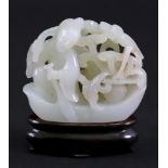 A good Chinese pale celadon jade group, Qing dynasty,