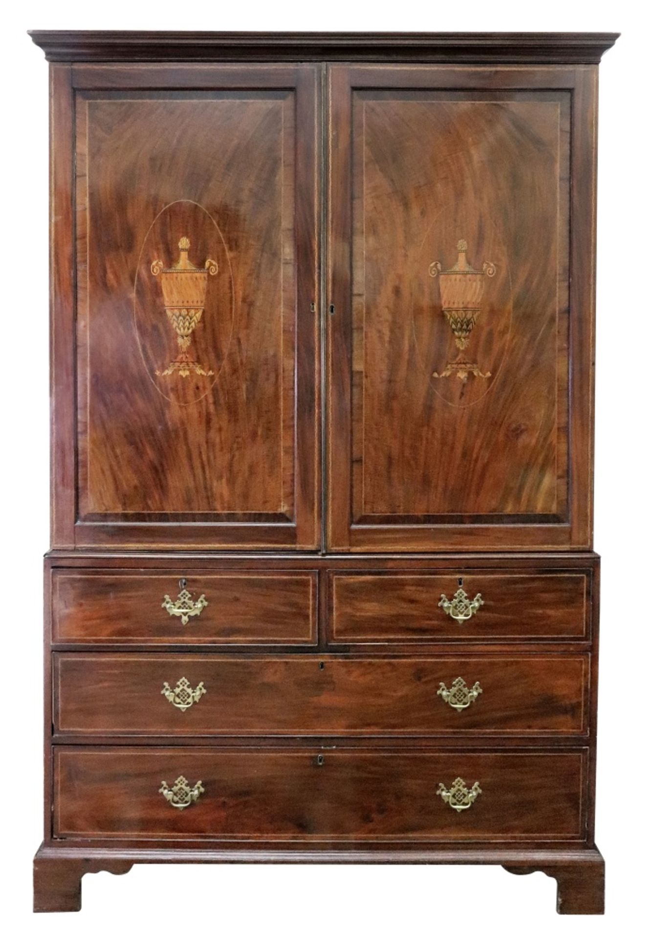 A George III mahogany boxwood and ebony banded linen press, with moulded cornice,