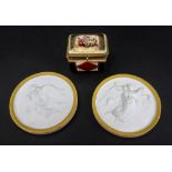 A pair of Royal Copenhagen biscuit small circular plaques, late 19th century,
