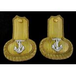 A pair of Naval officers gold bullion epaulettes applied with silver bullion foiled anchors,