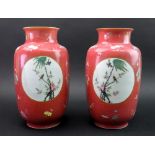 A pair of Chinese pink ground sgraffito famille rose vases, Republic period,