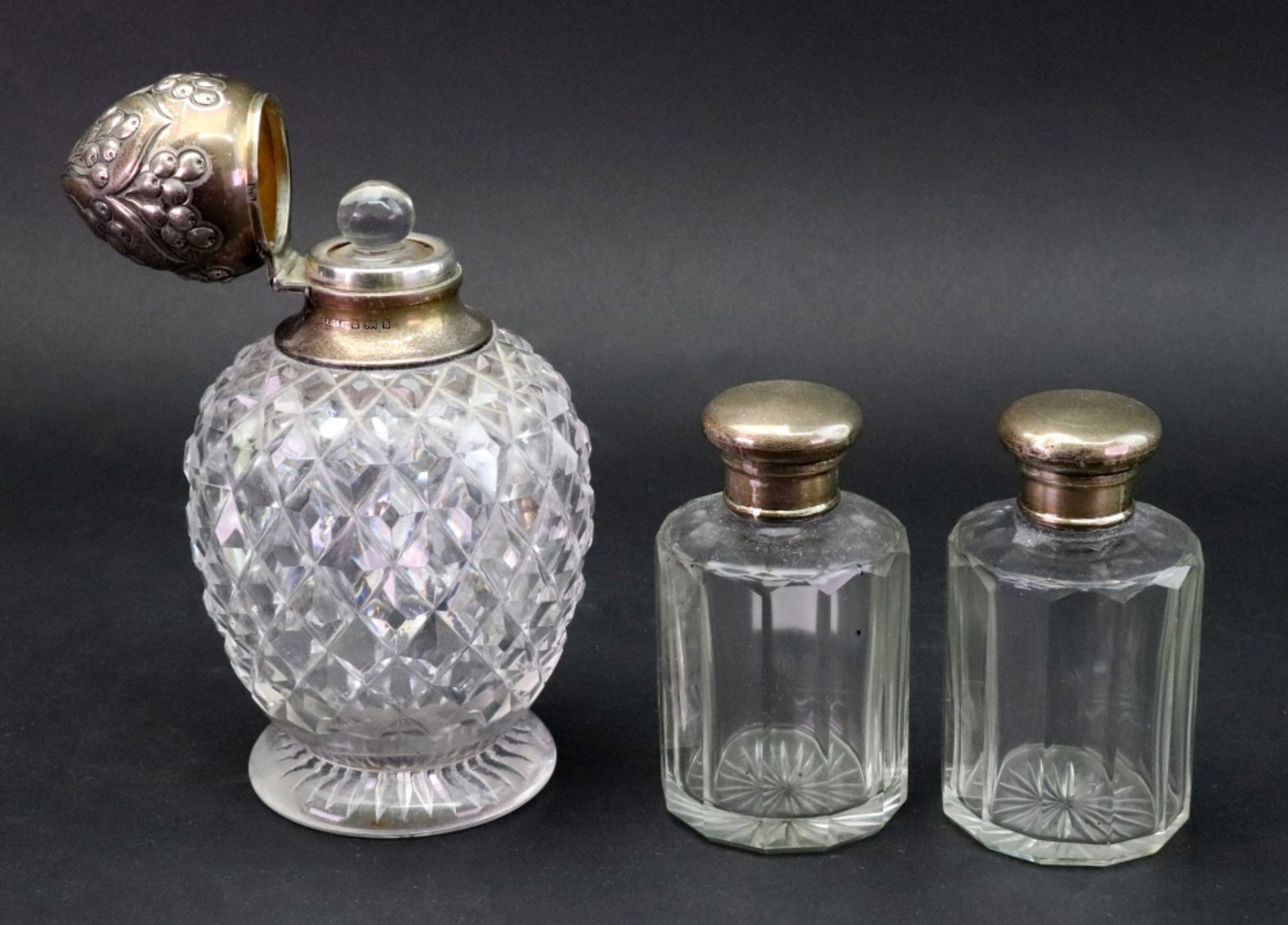 An Edwardian silver mounted diamond cut glass baluster shape perfume bottle, John Grinsell & Sons, - Image 2 of 2