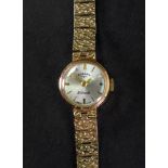 Rotary; a lady's 9ct gold bracelet watch, the dial with raised baton hour markers and hands,