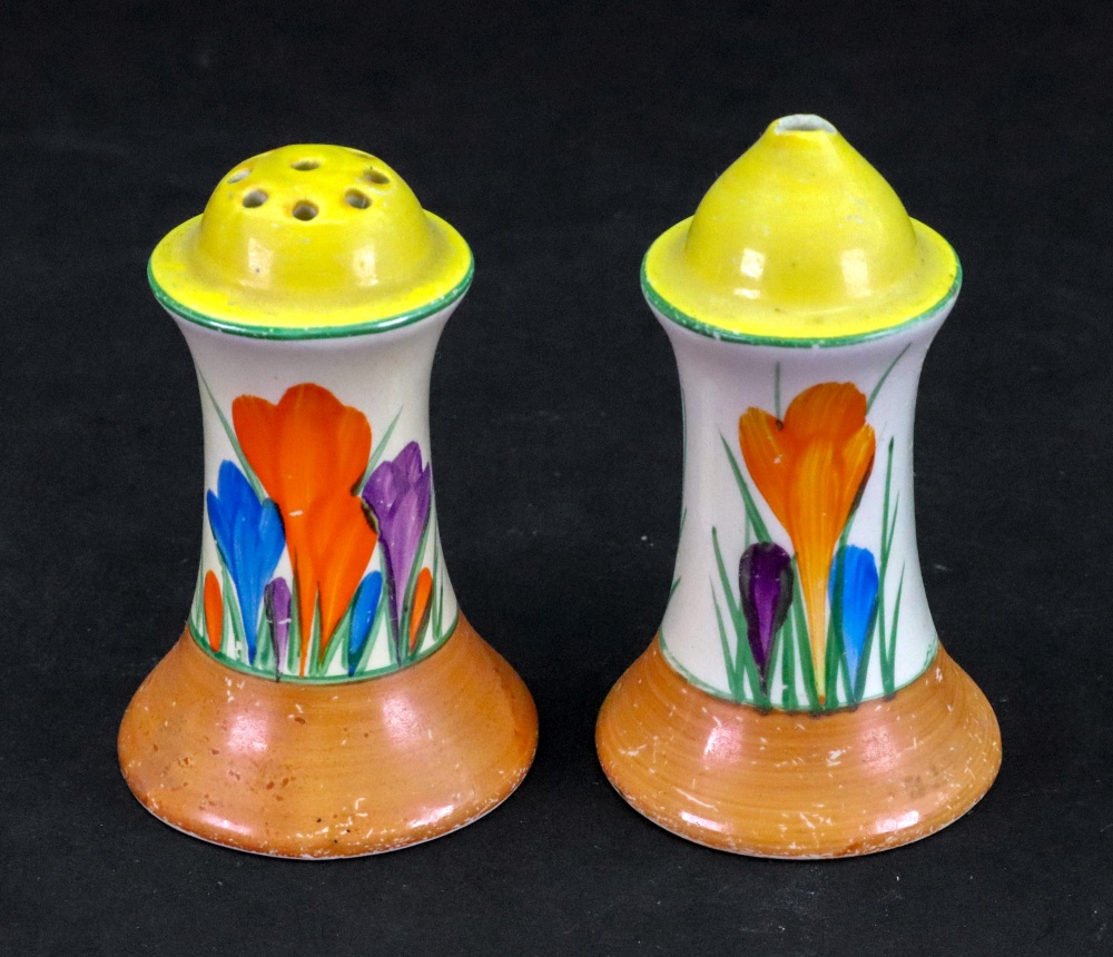 A Clarice Cliff salt and pepperette painted in the 'Crocus' pattern, 1930's, printed marks, 8.