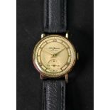 J W Benson; a gentleman's 9ct gold wristwatch, the dial with raised gilt Roman numerals,