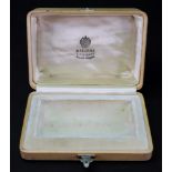 Fabergé; a rectangular hollywood cream silk and velvet lined box,