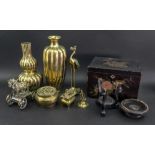 A group of Asian polished bronzed works of art, 19th/20th century,