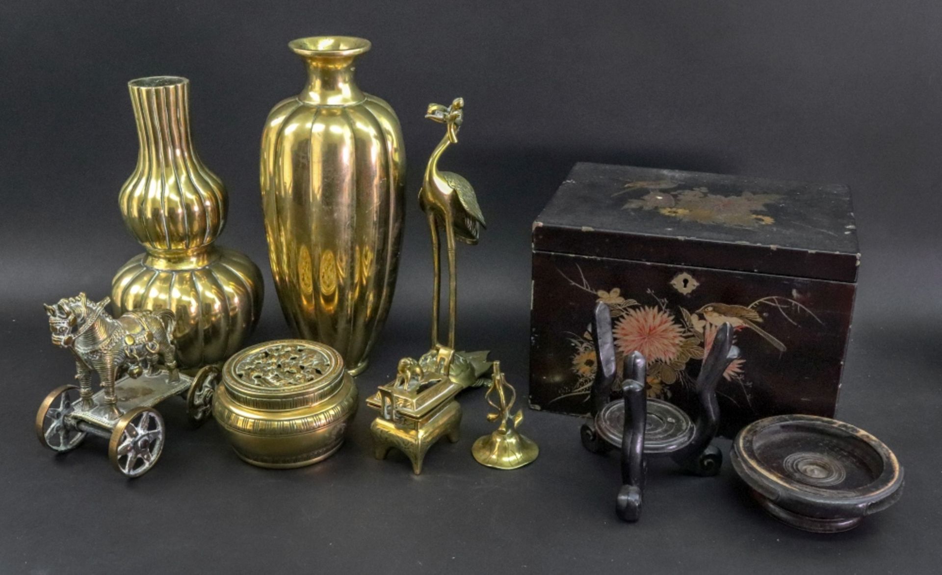 A group of Asian polished bronzed works of art, 19th/20th century,