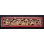 A Chinese painted and gilded wood panel, late 19th century, carved with figures, animals,