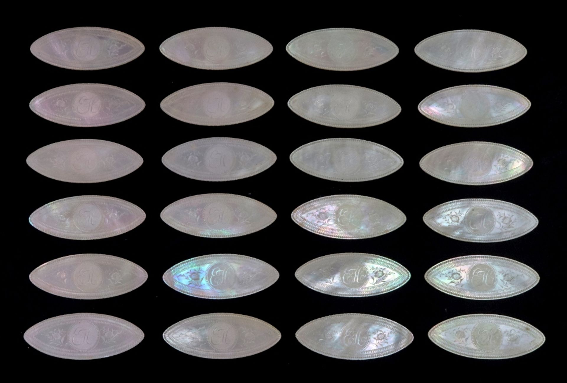 A set of 24 Chinese mother of pearl navette shape gaming counters, first half 19th century,