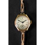 J W Benson; a 9ct gold bracelet watch, the dial with Arabic numerals and subsidiary seconds dial,