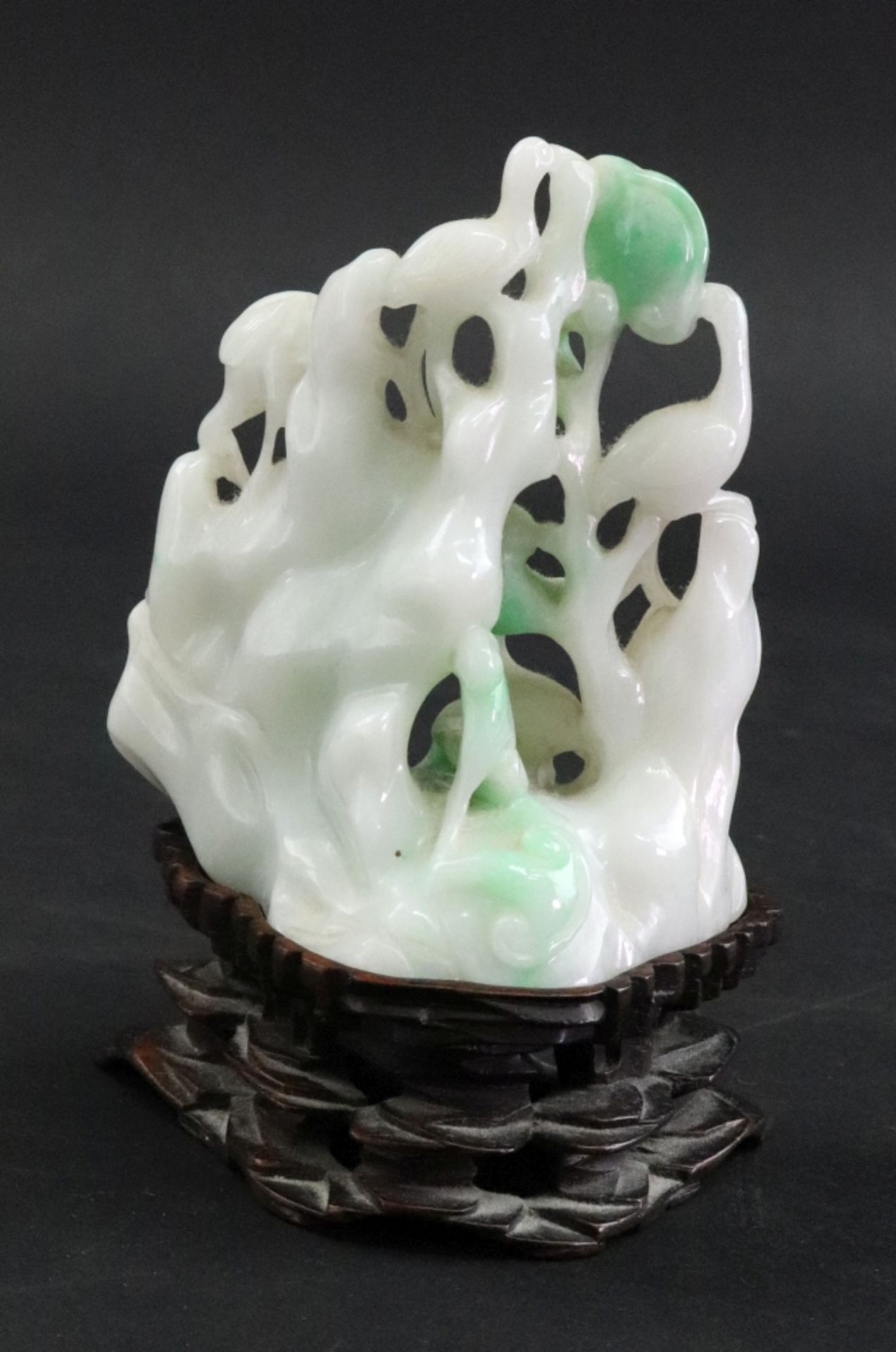 A Chinese jade carving, 20th Century, of four storks amongst trees and rockwork, 8cm high, - Image 2 of 6