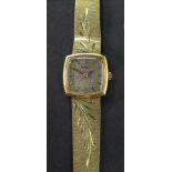 Eterna; a lady's 14ct gold bracelet watch, the square dial with raised baton hour markers and hands,
