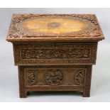 An Indian foliate carved hardwood stool, late 19th century,