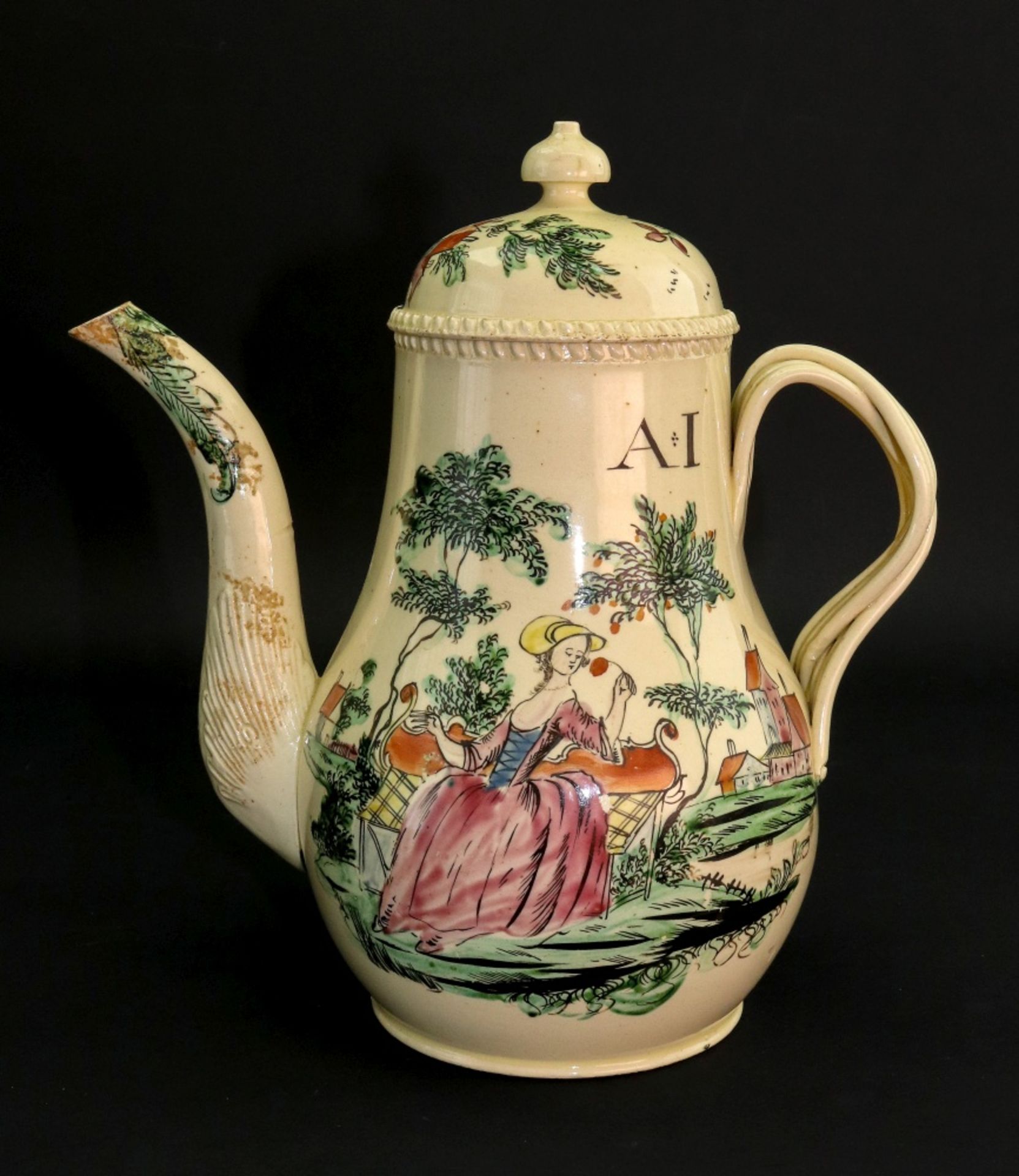 A Leeds creamware pear shape coffee pot and cover, circa 1770, set with an entwined ribbed handle,