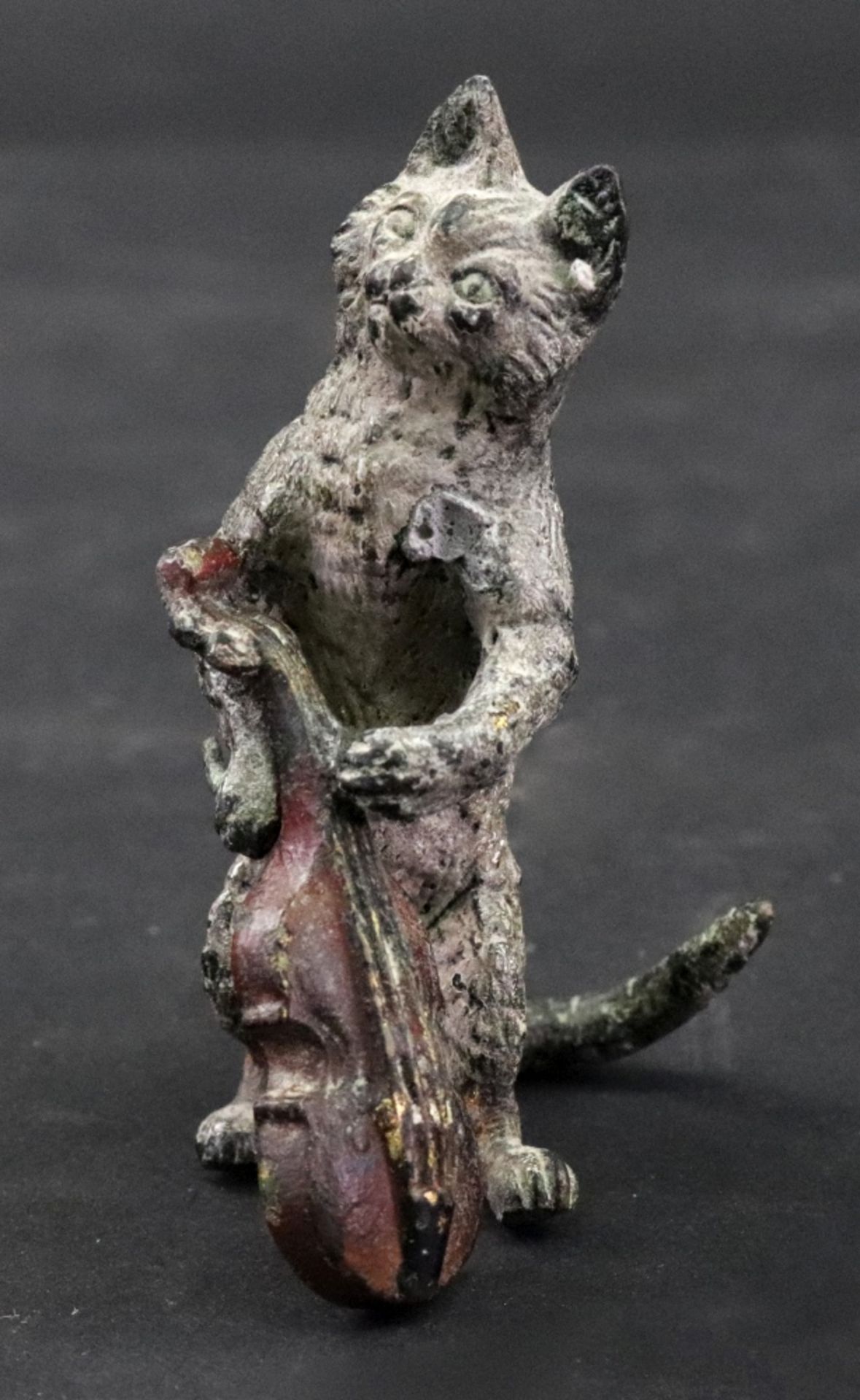 A Viennese cold painted bronze figure of a standing cat musician, circa 1900, playing a cello, 6.
