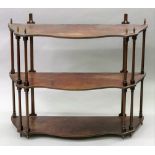 A set of George III style mahogany three tier wall hanging shelves, early 20th century,