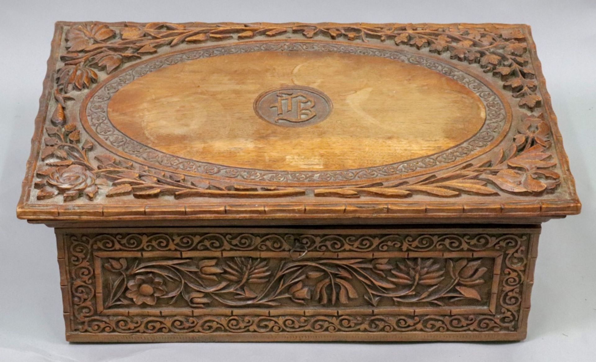 An Indian foliate carved hardwood stool, late 19th century, - Image 2 of 2