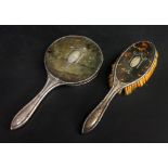 A silver mounted tortoiseshell backed hand mirror and hair brush, London 1914,
