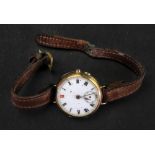 A 9ct gold wristwatch, the white enamel dial with Roman numerals and subsidiary seconds dial,