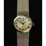 Baume & Mercier; a lady's 18ct gold bracelet watch, the oval dial with Roman numerals,