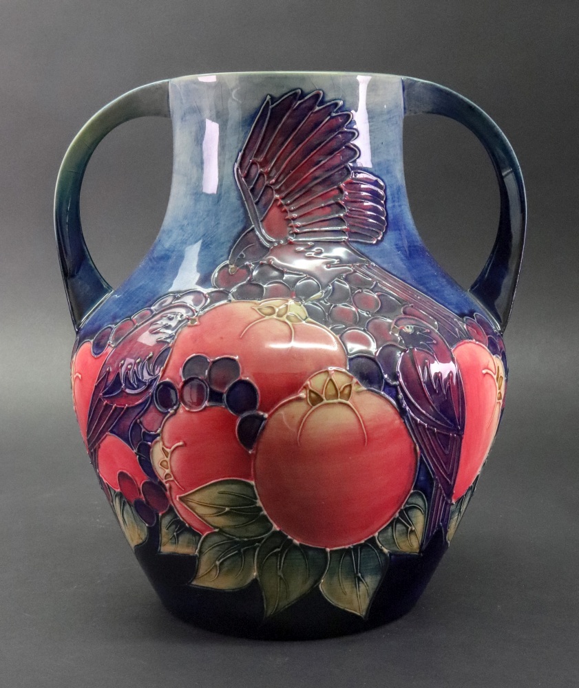 A Moorcroft two handled vase, circa 1994, tube lined and decorated with the 'Finches' pattern,