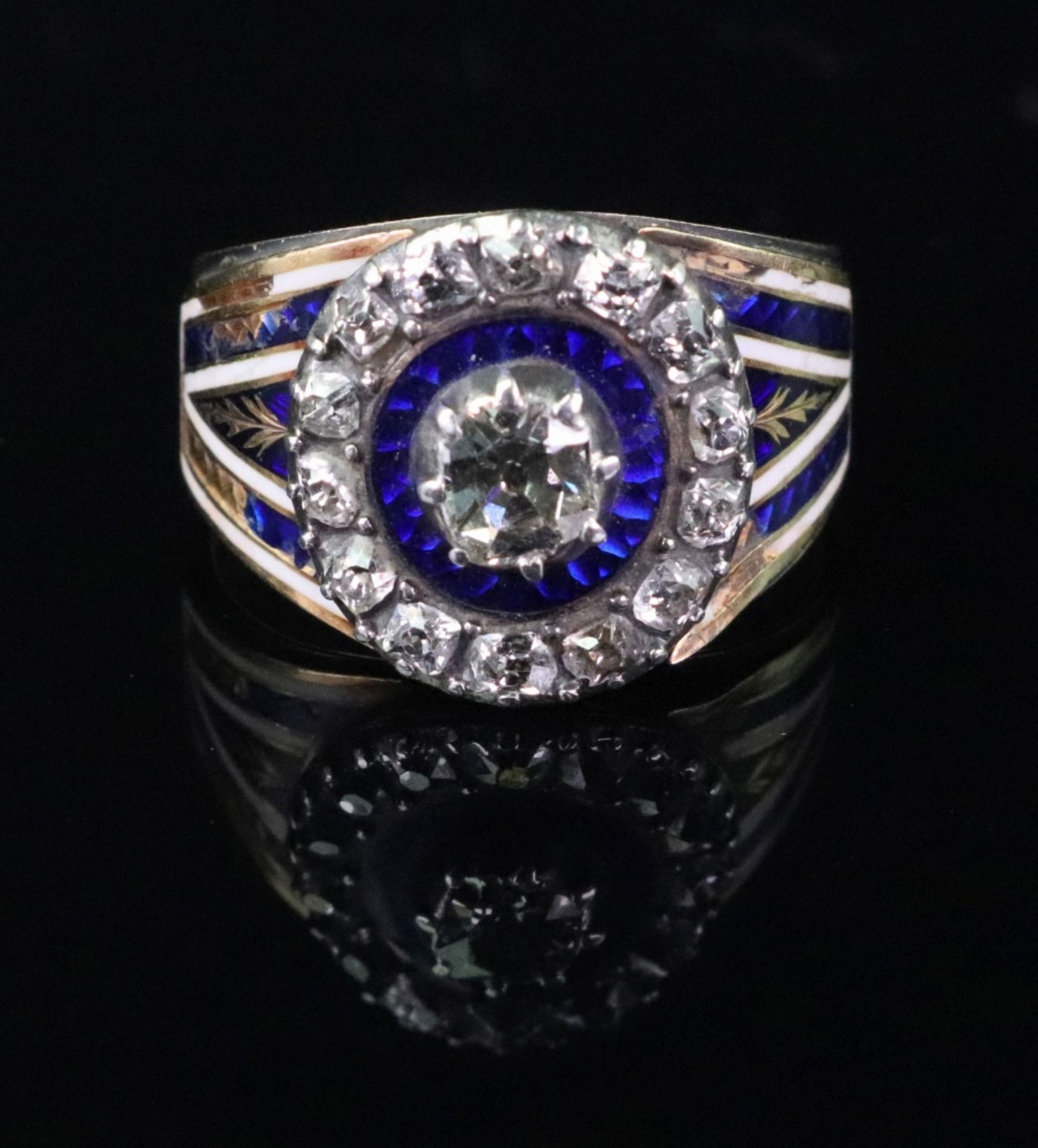 An early 19th century gold, enamel and diamond set ring,