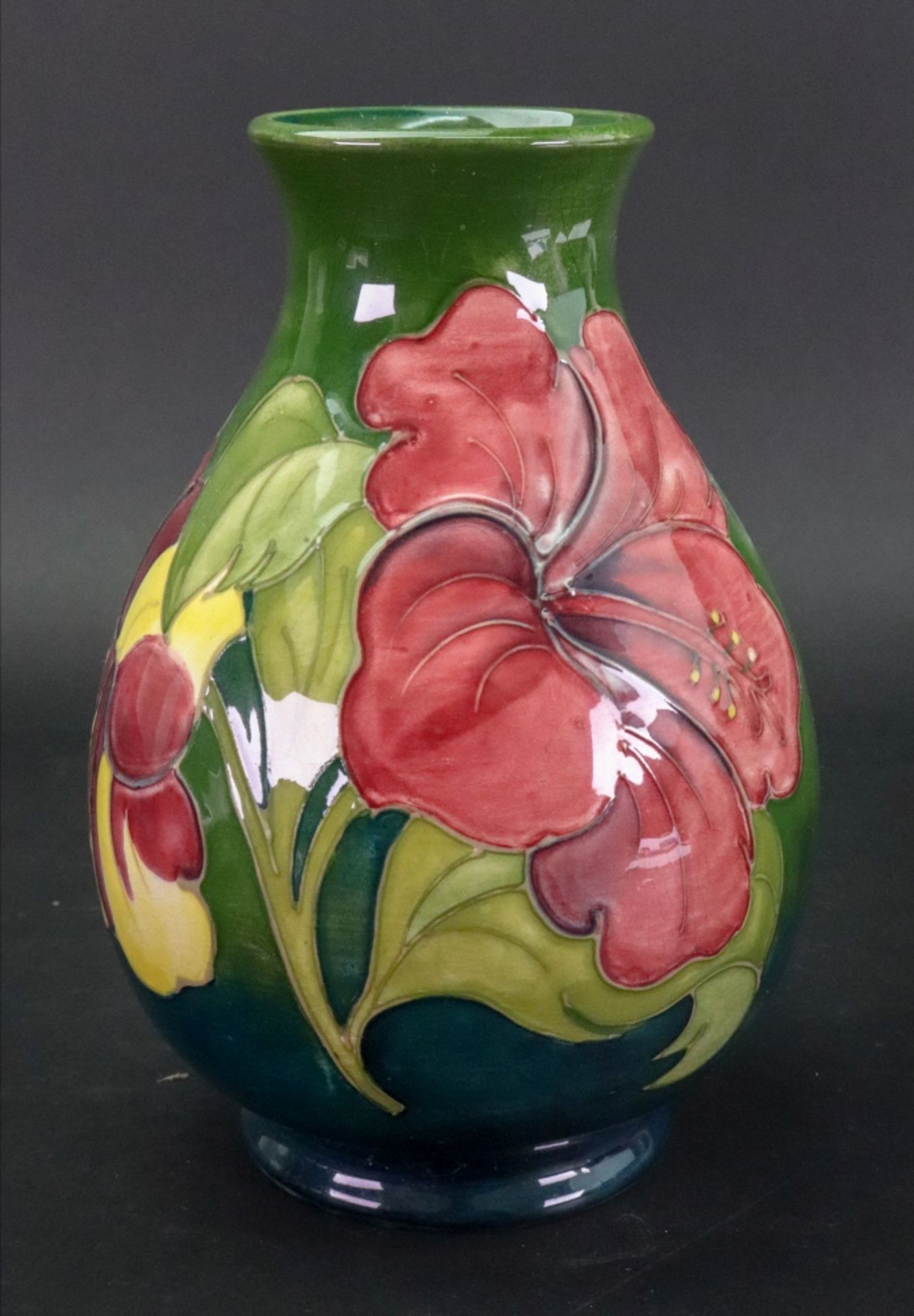 A Walter Moorcroft pear shaped vase,