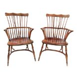 A pair of ash and elm Windsor elbow chairs, second half 19th century, with comb backs,