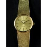 Omega; De Ville, a lady's 18ct gold automatic bracelet watch,