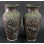 A pair of Japanese mixed metal vases, Meiji period, of slender ovoid form,